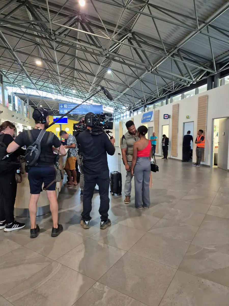 TV crew filming an arrival scene at Ivato airport, Antananarivo